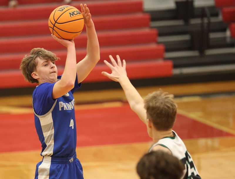 Princeton's Julian Mucha shoots a jump shot over Eureka's Moses Dohner during the Colmone Classic on Thursday, Dec. 11, 2025 at Hall High School.