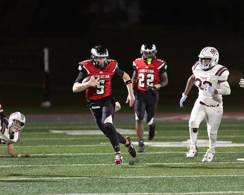 Aurora Christian's Asa Johnson runs the ball against Wheaton Academy on Friday, Oct. 17,2025 in Aurora.