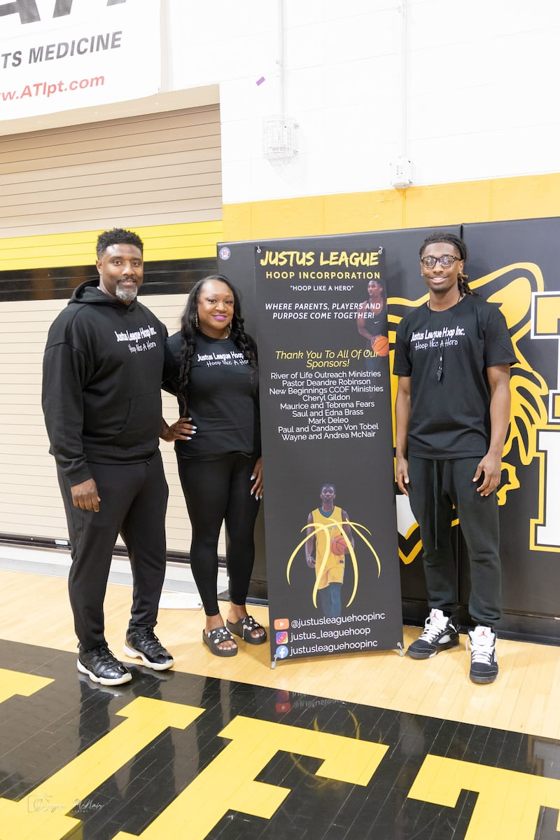 Joliet West High School alumnus Justus McNair, 19, (right) is the founder of Justus League Hoop Inc., which supports mental health in student-athletes. Justus McNair is pictured with his parents (from left) Wayne McNair and Andrea McNair.