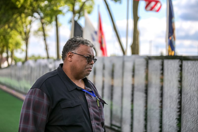 John Hayes of Joliet stands in front of the Vietnam Traveling Memorial Wall. His father fought in World War II. Thursday, Aug 21, 2025 in Romeoville.