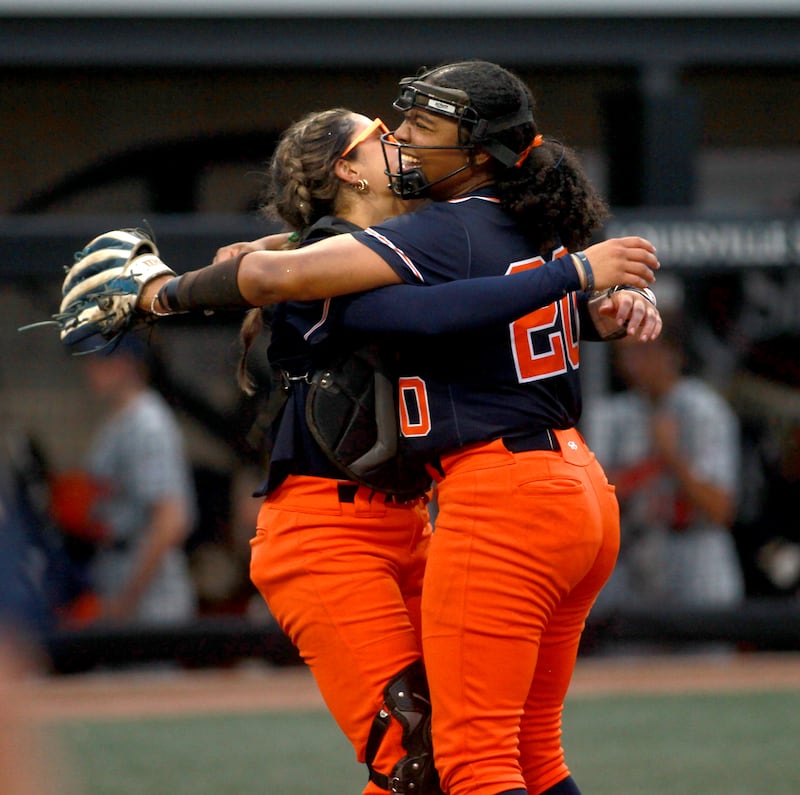 Oswego's Kiyah Chavez and Jaelynn Anthony celebrate their IHSA Class 4A state semifinal game win over Oak Park-River Forest on Friday, June 13, 2025 at the Louisville Slugger Sports Complex in Peoria.
