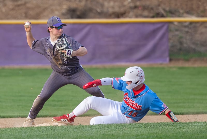 Dixon’s Jake Zepezauer looks to turn the double play as Oregon’s Jack Washburn slides into second Thursday, April 24, 2025.