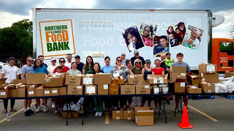The volunteers outside the mobile food pantry event held in Seneca by the Village Christian Church and the Northern Illinois Food Bank.