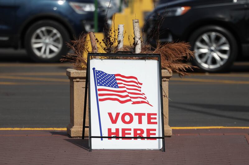a Vote Here sign sits outside the Will County Office Building onTuesday, March 19, 2024 in Joliet.