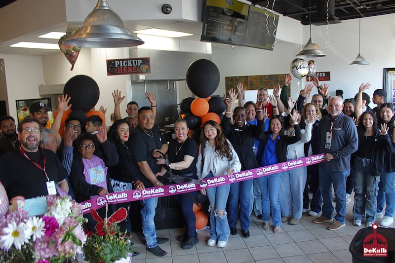 The DeKalb Chamber of Commerce celebrating Taco Alley's opening