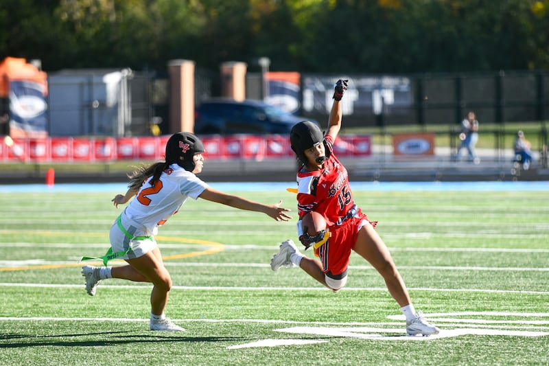 Bradley-Bourbonnais' Nevaeh Brown evades a Whitney Young defender during the Boilermakers' 35-8 loss in the IHSA Girls Flag Football State Final third place game on Oct. 19, 2024.