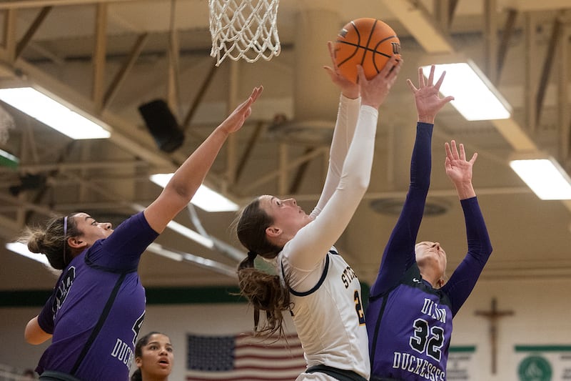 Sterling’s Madison Austin puts up a shot against Dixon Thursday, Feb. 27, 2025, during the Class 3A girls Sectional title at Rockford Boylan High School.