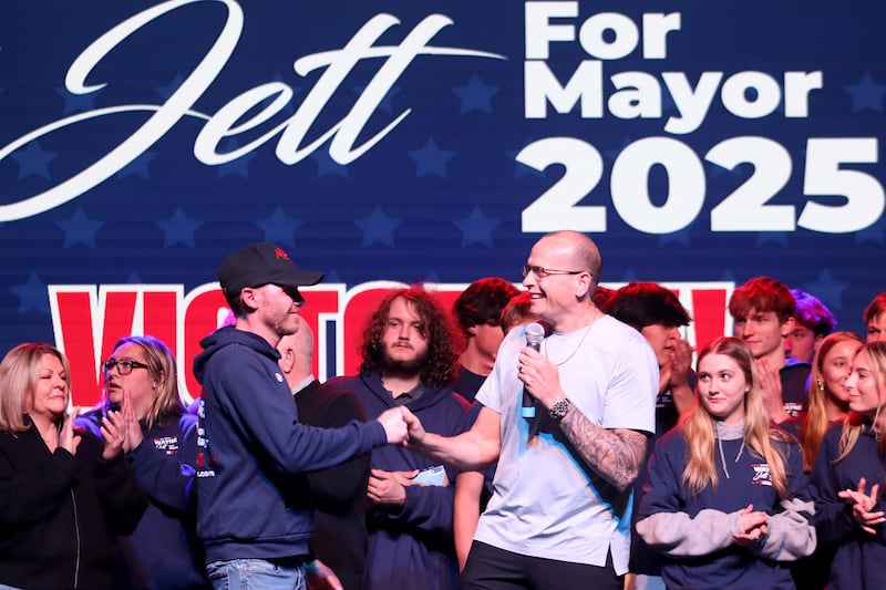 McHenry mayoral candidate and incumbent Wayne Jett hosted an election night party at The Vixen in McHenry on Tuesday, April 1, 2025. Jett greets his campaign manager.