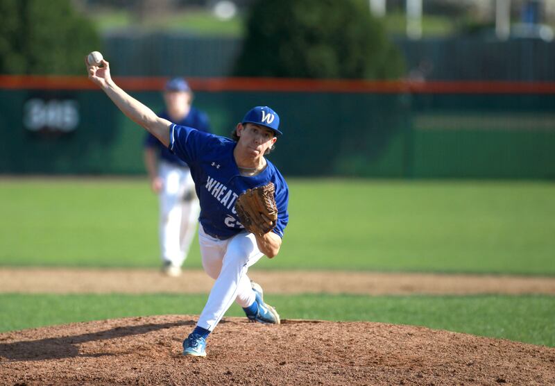 Wheaton North's Cale Zoeller pitches during a game against St. Charles East on Wednesday, April 23, 2025 in St. Charles.
