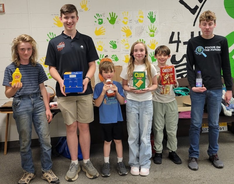 Pictured with the donated food are David Bagwell, David Wehler, Colton Gipper, Izabel Cortinez, Luis Smith and Kolton Motszko.