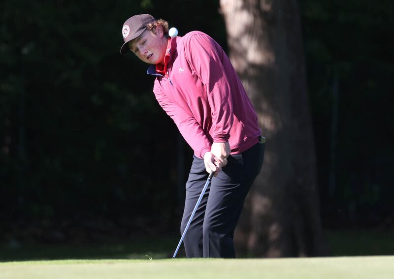 Ottawa’s Bryer Harris chips onto the third green Monday, Sept. 23, 2024, during the Interstate 8 boys golf tournament at the Kishwaukee Country Club in DeKalb.