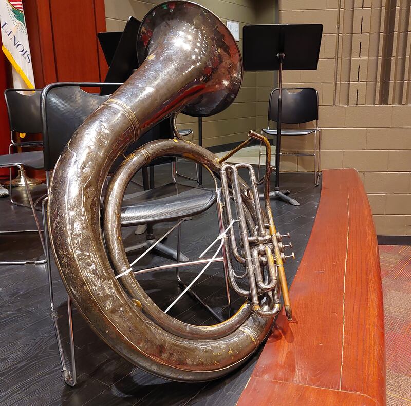 An empty seat was reserved Sunday, Dec. 19, 2023, during the TUBACHRISTMAS concert at Hall High School in Spring Valley in honor of Antone Smania, of Oglesby, who died in 1999. His Helicon tuba also was on display.
