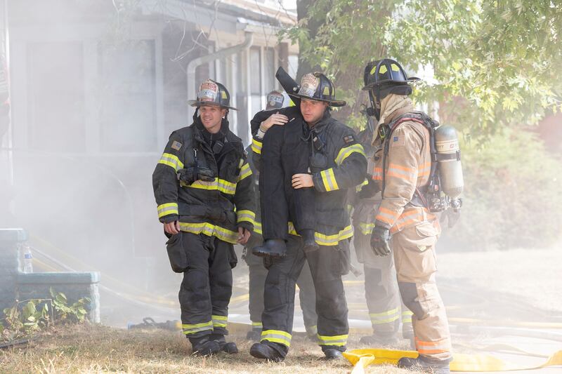 Firefighters make a rescue during a training session Tuesday, Sept. 23, 2025, in Dixon. The training is part of an ongoing effort to standardize leadership and improve emergency response.