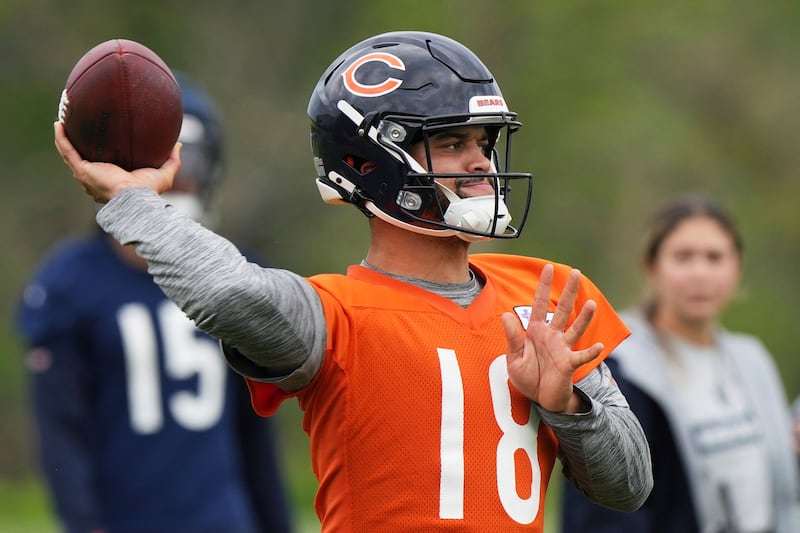 Chicago Bears quarterback Caleb Williams throws a ball during NFL football practice in Lake Forest, Ill., Wednesday, May 28, 2025. (AP Photo/Nam Y. Huh)