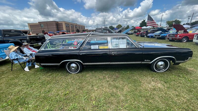 Bill and Joann Wagaman of Rockford sit behind their 1965 Oldsmobile Vista Cruiser station wagon at the 34th Annual Hib Reber Memorial Car Show in Byron on Saturday, July 12, 2025.