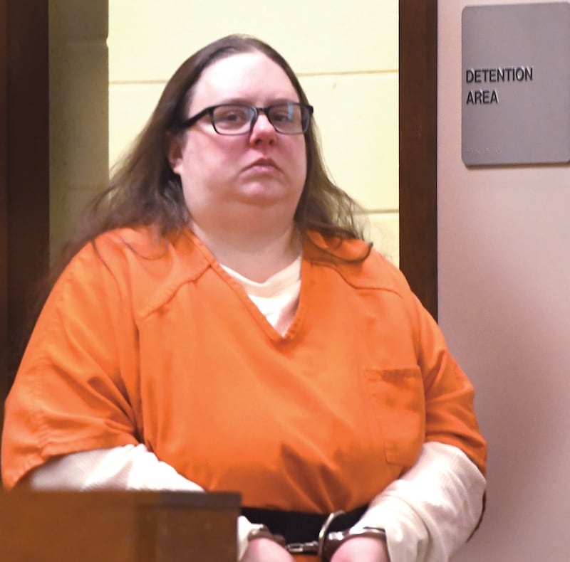 Sarah Safranek is escorted into an Ogle County courtroom on Wednesday, Nov. 12, 2025. She pleaded guilty to the first degree murder of her 7-year-old son, Nathaniel Burton, in 2021 and was sentenced to 35 years in prison.