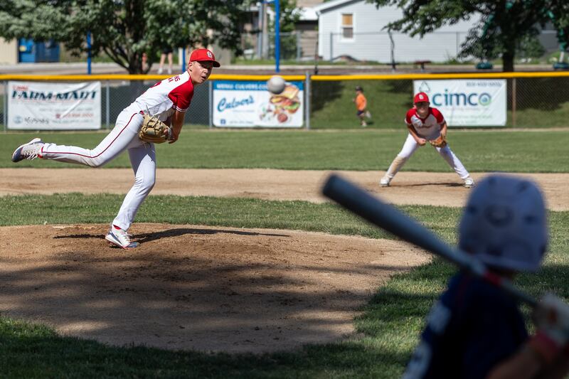 Adrik Gaworski (12) of the Cardinals delivers a pitch in the Ottawa Little League 12U city championship game Saturday, June 21, 2025, at Varland Park in Ottawa.