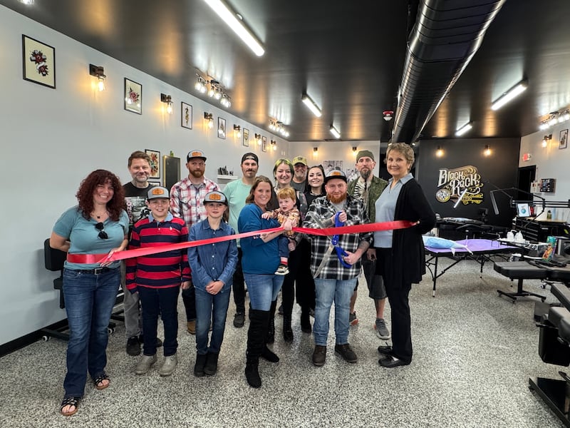 Black Rock Tattoo owner Brandon Plata with family & team.
