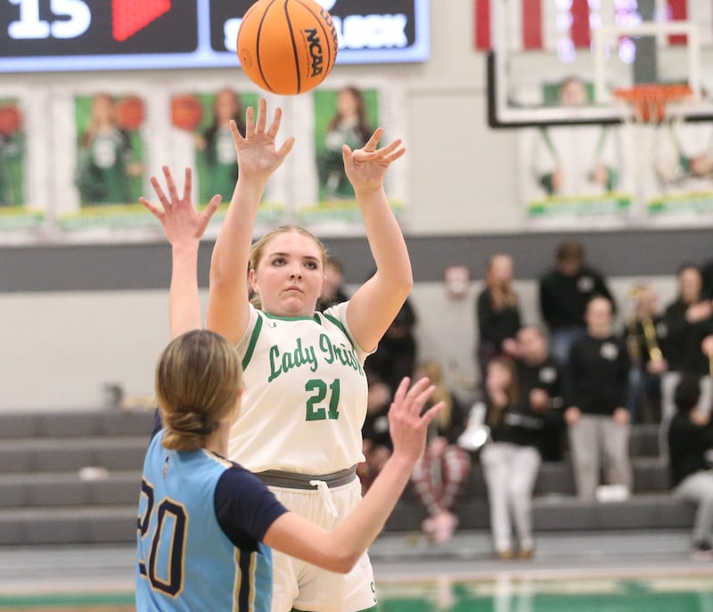 Seneca's Camryn Stecken lets go of a shot over Marquette's Kaitlyn Davis on Thursday, Feb. 5, 2026 at Seneca High School.