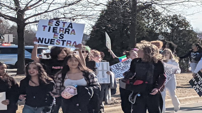Oswego East H. S. students walk out of school to protest actions of ICE agents