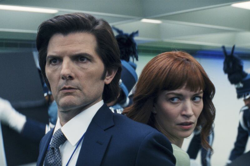 This image released by Apple TV+. shows Adam Scott, left, and Britt Lower in a scene from "Severance." (Apple TV+ via AP)