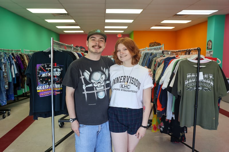 James LeRoy, left, and Jessi Bosie, co-owners of Glue Man Vintage & Records, pose for a photo during the store's grand opening Friday at 616 S. Main St. in Bourbonnais. The site is the former Quilt Shop of the now-closed B&J Sewing Center.