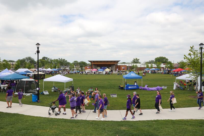 Cancer survivors and caregivers take the second lap during the Relay for Life of Kankakee County on June 14, 2025, at The Grove in Bourbonnais.