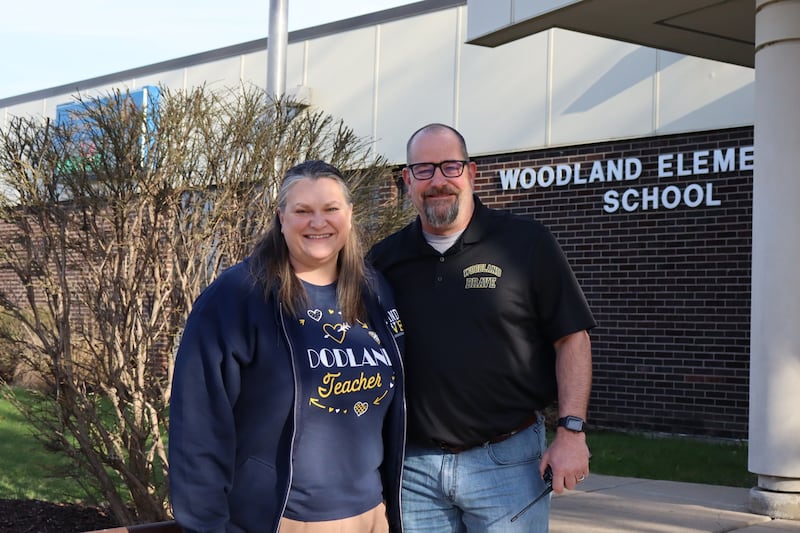 Jason and Jennifer Kuefler are seen outside Woodland Elementary School in Joliet, on Monday, April 7, 2025. Both Jason Kuefler and Jennifer Kuefler started their teaching careers in 2000 at Joliet Public School District 86 and have taught at District 86 for 25 years. Jason Kuefler has spent all 25 years at Woodland Elementary School, where he currently teaches third grade. Jennifer Kuefler has spent 21 years at Woodland Elementary School, where she currently teaches fifth grade.