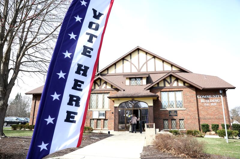 Voters enter the building to vote in the 2025 Consolidated Election on Tuesday, April 1, 2025 at the Sugar Grove Township Community Building in Sugar Grove.