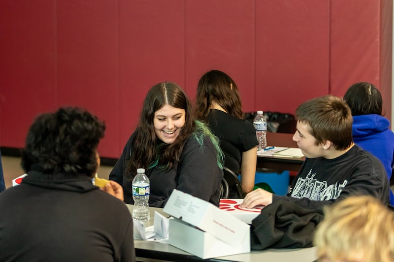Louis Mendieta, Wesleigh Grant, and Tristan Bowling enjoy the Chick-fil-A Leader Academy at Lincoln School on Sept. 9, 2025.