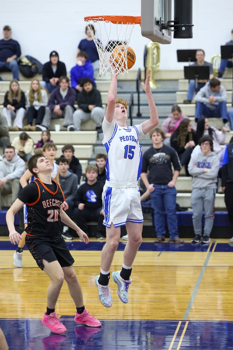 Peotone's Ethan McNeill hits a layup Beecher's during the Blue Devils' 64-52 victory over Beecher on Wednesday, Jan. 28, 2026.