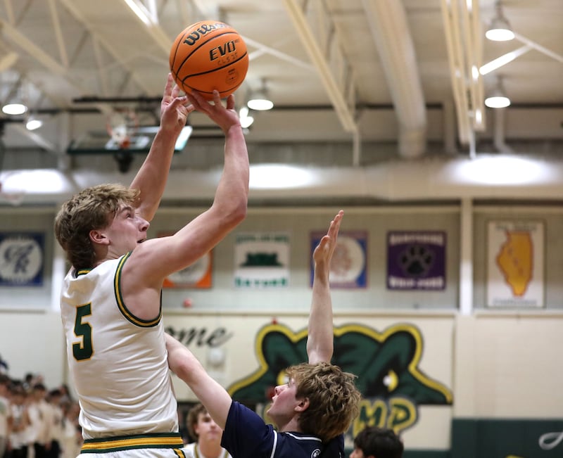 Crystal Lake South's Carson Trivellini shoots the over Cary-Grove's Conner Strike during a Fox Valley Conference boys basketball game on Friday, Jan. 23, 2026, at Crystal Lake South High School.