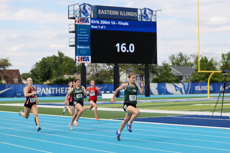 West Carroll’s Emma Randecker holds the lead in the 200 m dash during the IHSA Class 1A Girls Track & Field State Finals on Saturday, May 24, 2025.