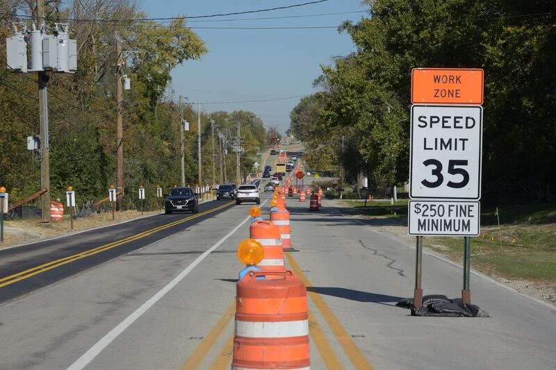 Signage informs drivers of a work zone speed limit along a 2024 construction project by the Will County Division of Transportation.