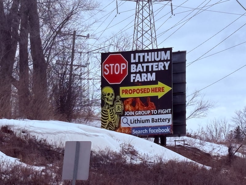 A billboard opposing the possible battery storage facility along Route 176 near Prairie Grove.
