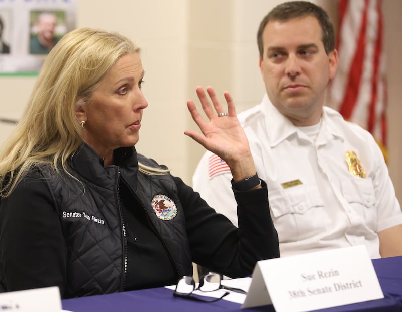 Illinois State Sen. Sue Rezin. R-Morris speaks as Utica Fire Chief Ben Brown listens during the Starved Rock Safety Update meeing on Monday, May 11, 2026 at the Utica Fire Station. The meeting serves as an opportunity to discuss safety, visitor experience, and general updates related to the park.