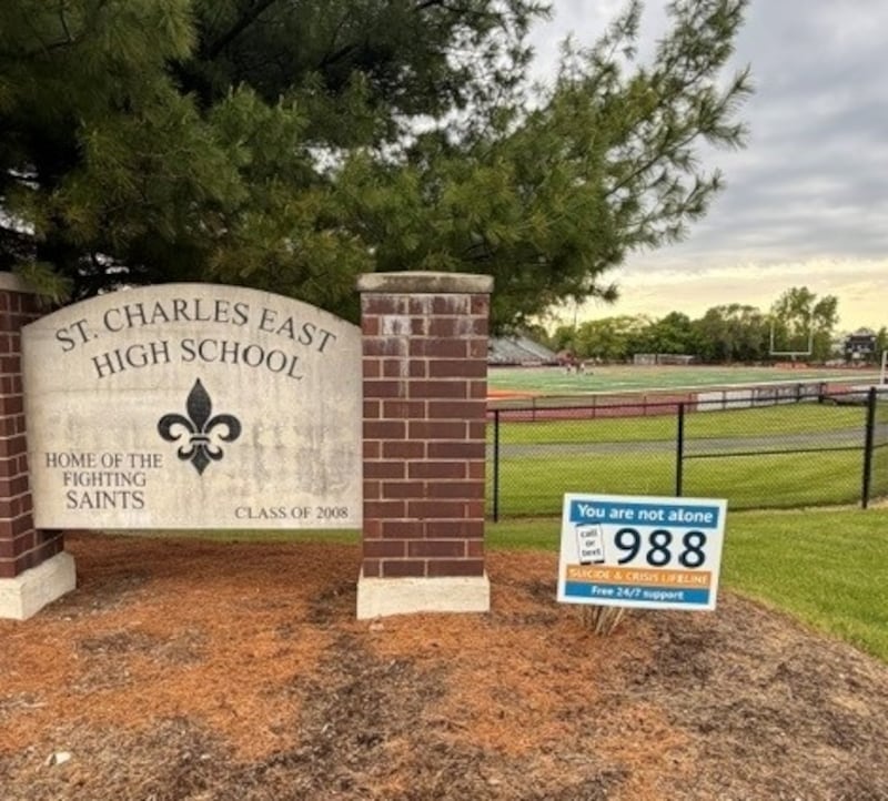 A 988 Suicide & Crisis Lifeline sign outside St. Charles East High School is intended to raise awareness of the relatively new three-digit number. More knowledge of the number has shown to reduce the suicide rate among young people age 15-34.