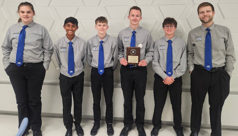 Princeton High School Scholastic Bowl Team members Gabriel Elliott (from left), Reuel Pattar, Brady Gross, Aiden Robinson, Brady Peach, and Scholastic Bowl Team head coach Brody Anderson