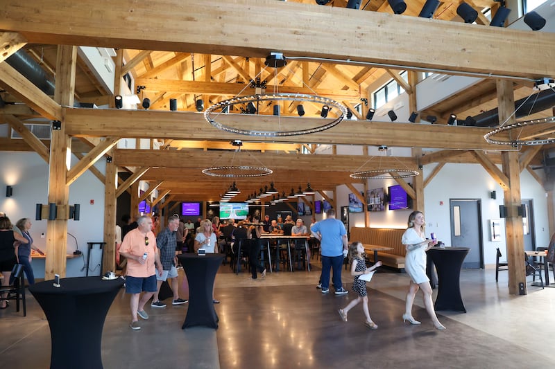 Attendees tour Bradley's 315 Sports Park during a Bradley Business After Hours event on Tuesday, July 29, 2025.