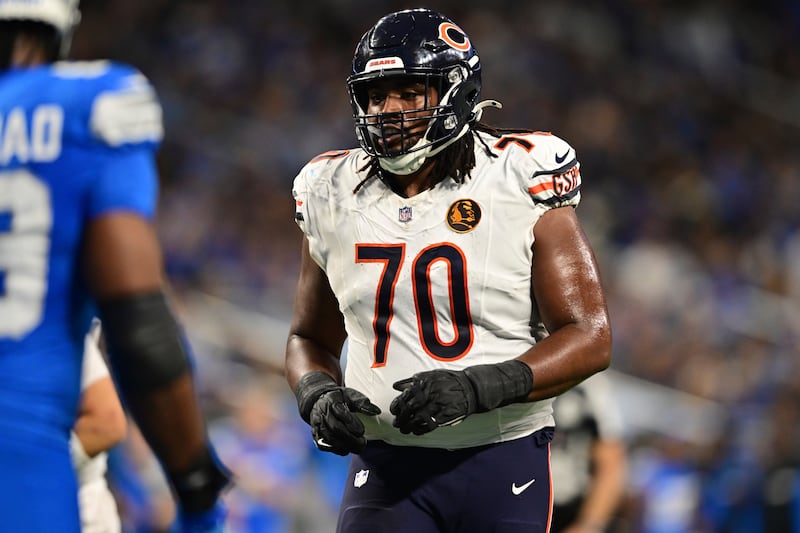 Chicago Bears offensive tackle Braxton Jones lines up during the second half of an NFL football game against the Detroit Lions in Detroit, Thursday, Nov. 28, 2024. The Lions won 23-20. (AP Photo/David Dermer)