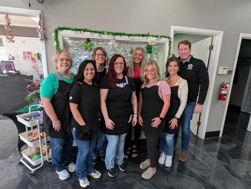 State Rep. Brad Fritts (back row, far right) presents his March Local Business Highlight Award to B'lush Salon in Sterling.