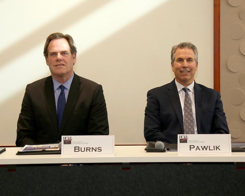 Geneva mayoral candidates Kevin Burns, incumbent, and Karsten Pawlik get ready to speak at the candidate forum hosted by the League of Women Voters of Central Kane County was held on Sunday, Feb. 9, 2025 at the Geneva Public Library.