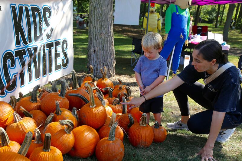 Wyatt and Mary Fetzer look at the pumpkins at Yorktoberfest in Yorkville on Saturday, Sep. 27, 2025.