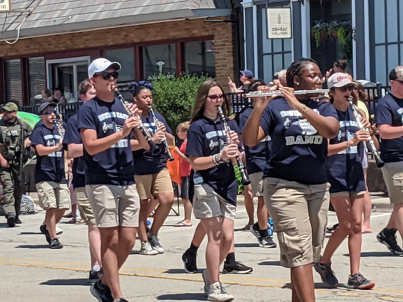 The Oswego East High School Band marched through downtown Oswego June 16 in the PrairieFest Parade.