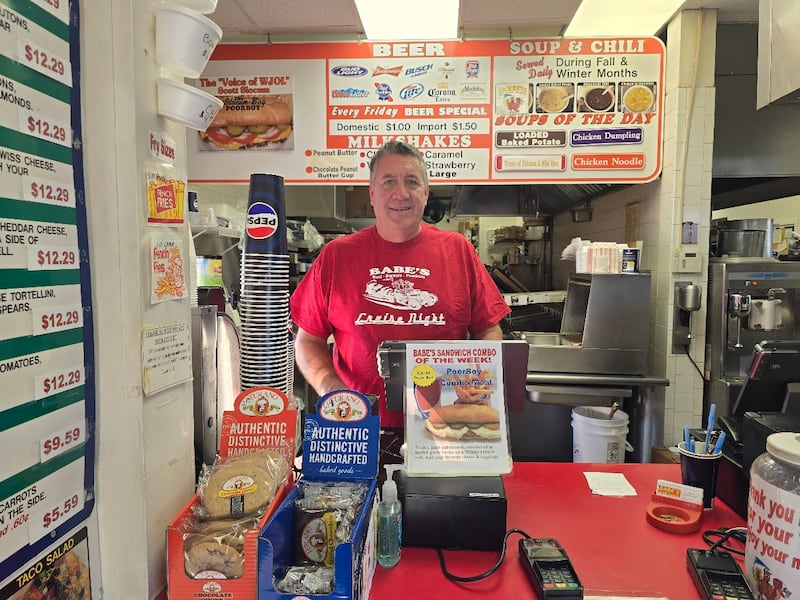 Tim Reilly, owner of Babe's Hot Dogs in Joliet, which he founded 37 years ago at the age of 25, is seen at the helm of his restaurant early on Tuesday, Dec. 9, 2025. Reilly has listed his business, which many consider a staple in the community, for sale.