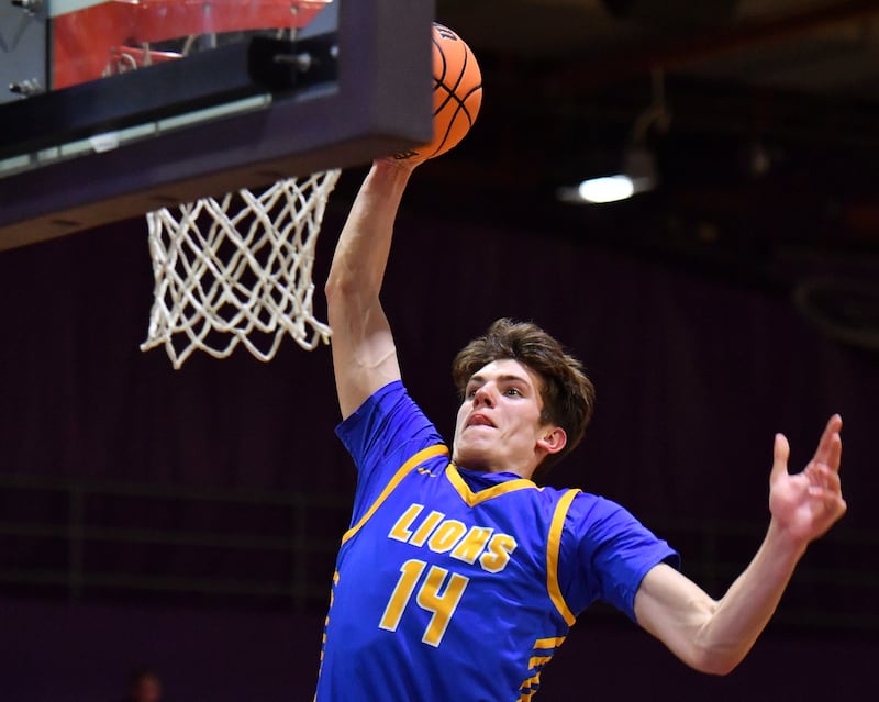 Lyons Township’s Grant Smith dunks the ball during a game against Downers Grove North on January 15, 2026 at Downers Grove North High School in Downers Grove .
