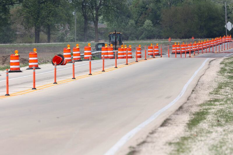 Traffic cones line Peace Road Thursday, May 15, 2025, as construction continues on the section between Route 64 and Freed Road in Sycamore.