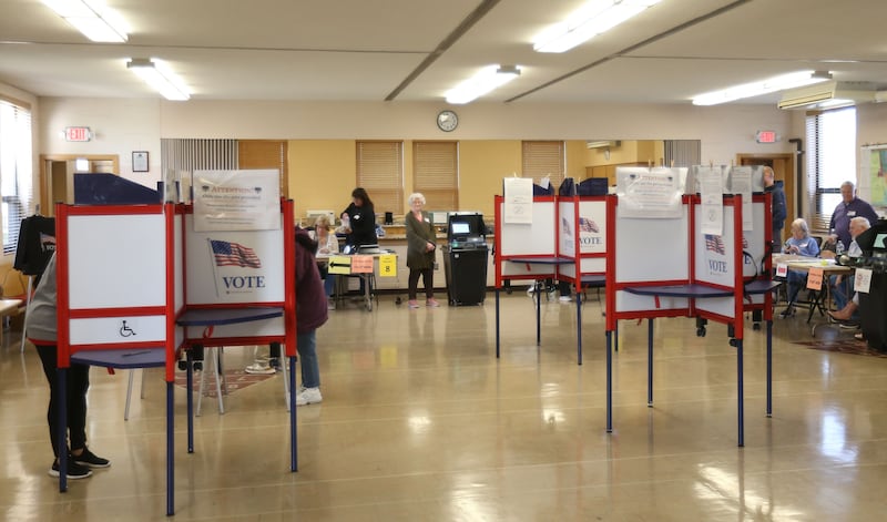 Voters fill their ballots on Tuesday, April 1, 2025 at St. Johns Lutheran Church in Peru.