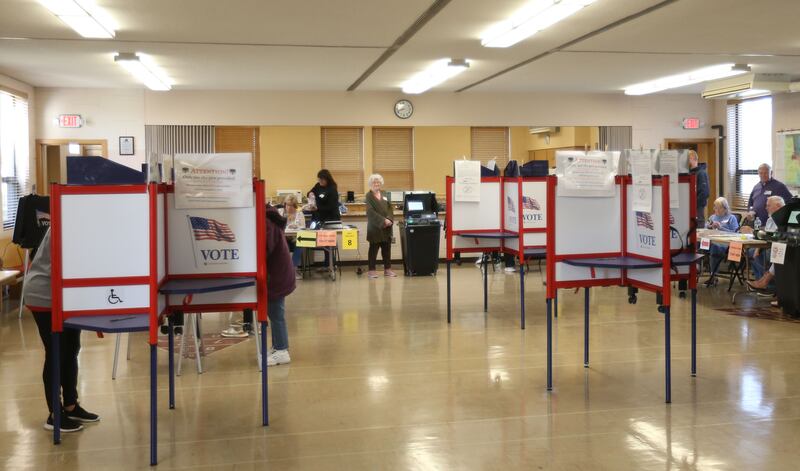Voters fill their ballots on Tuesday, April 1, 2025 at St. Johns Lutheran Church in Peru.