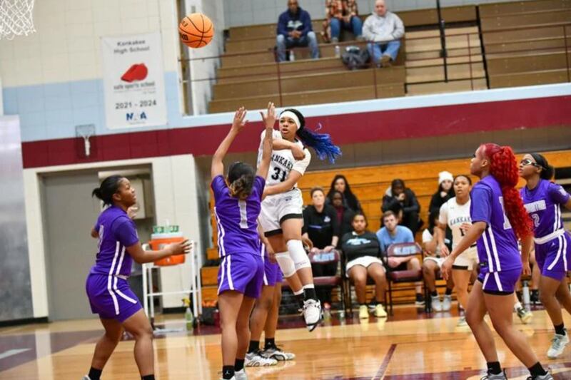Kankakee's TaLeah Turner throws a pass to the outside Monday night during the Kays' 54-32 victory over Thornton.